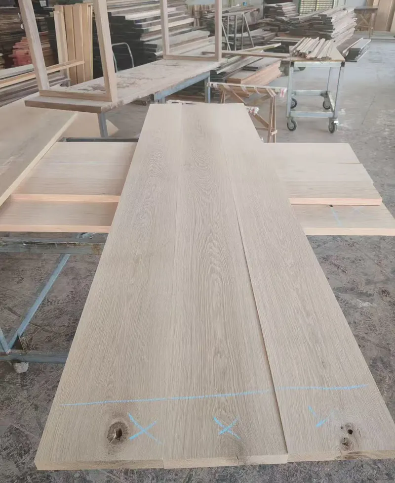 Raw wood countertop panel during production cutting process