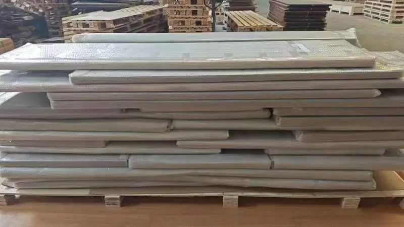 Wrapped countertop panels stacked on export pallet